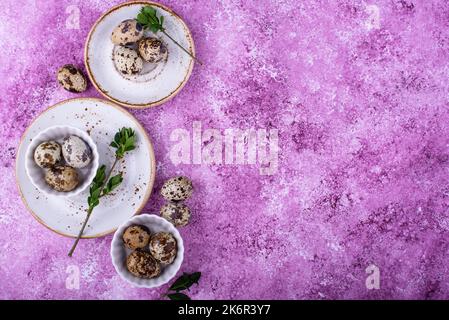 Bowl with quail eggs on light background Stock Photo