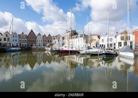 Goes - View to very cute Marina with awsome  reflections on the water, Zeeland, Netherlands, 21.03.2018 Stock Photo