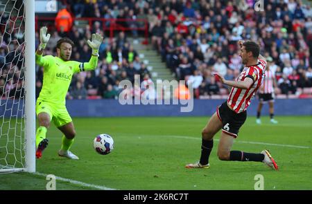 Sheffield, UK. 15th October 2022. Chris Basham of Sheffield Utd goes close to scoring  during the Sky Bet Championship match at Bramall Lane, Sheffield. Picture credit should read: Simon Bellis / Sportimage Credit: Sportimage/Alamy Live News Stock Photo