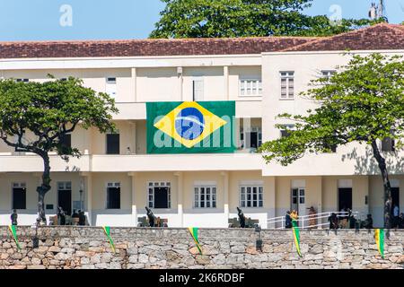 brazil flag at Copacabana fort in Rio de Janeiro, Brazil - September 07, 2022: Brazilian flag on the facade of Copacabana fort Rio de Janeiro. Stock Photo