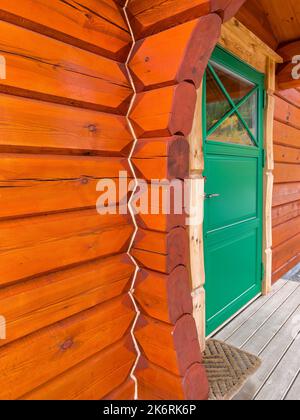 Front porch and entrance door, cottage style log, Norway Stock Photo