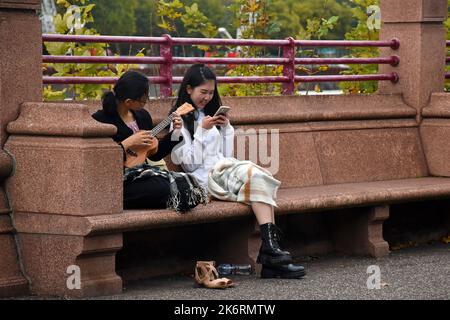 London, UK. 15th Oct, 2022. Sunshine and showers in Battersea Park. Credit: JOHNNY ARMSTEAD/Alamy Live News Stock Photo