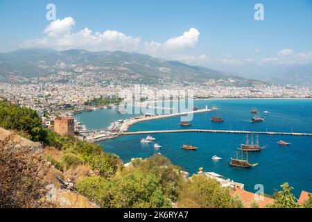 Alanya, Turkey – August 18, 2021. Aerial view over Alanya resort town on the Mediterranean coast of Turkey. Stock Photo