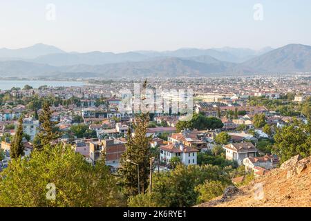 Fethiye, Turkey – August 21, 2021. Aerial view over Fethiye town on the Mediterranean coast of Turkey. Stock Photo