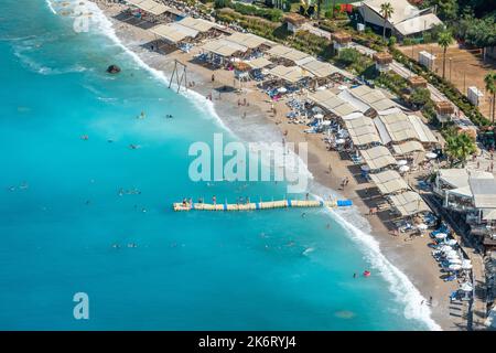Oludeniz, Mugla, Turkey – August 22, 2021. Beach on the Mediterranean coast in Kidrak neighbourhood of Oludeniz beach resort in the Fethiye district o Stock Photo