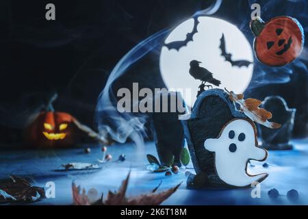 Cute spooky Halloween background. Moonlight in cemetery, Ghost flies through the cemetery with tombstones. Night of monsters. Bat silhouettes. Cemeter Stock Photo