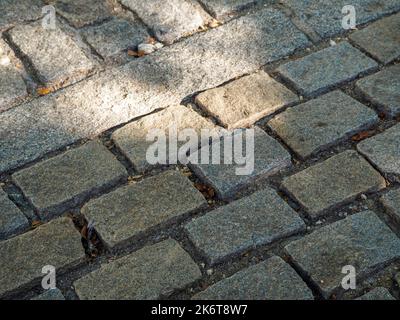 old granite block pavement. Sustainability and recycling concept Stock Photo