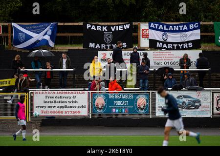 Merthyr Tydfil, UK. 15th Oct, 2022. Merthyr Town flags during the warm up. Merthyr Town v Folkestone Invicta in the FA Cup 4th qualifying round at Penydarren Park on the 15th October 2022. Credit: Lewis Mitchell/Alamy Live News Stock Photo