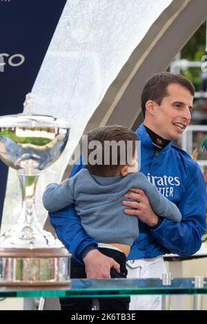 Ascot, Berkshire, UK. 15th October, 2022. William Buick realised a long-held ambition at Ascot today as he was crowned Champion Jockey for the first time. Racing legend Willie Carson presented him with the trophy. The 34-year-old has dominated the championship from the outset and begins the final day of the season on 157 winners, 67 clear of his closest challengers Hollie Doyle and Tom Marquand. Credit: Maureen McLean/Alamy Live News Stock Photo