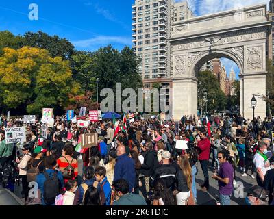 New York, United States. 15th Oct, 2022. New Yorkers gather at Washington Square Park in support of basic human rights for the people of Iran. This demonstration is connected to the death of Masha Amini, a 22-year-old Iranian woman, who died in police custody after allegedly violating the country's hijab rules. Her death has sparked protests across Iran and other countries. (Photo by Ryan Rahman/Pacific Press) Credit: Pacific Press Media Production Corp./Alamy Live News Stock Photo