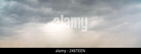 Dramatic sky background. Stormy clouds in dark sky. Moody cloudscape Stock Photo