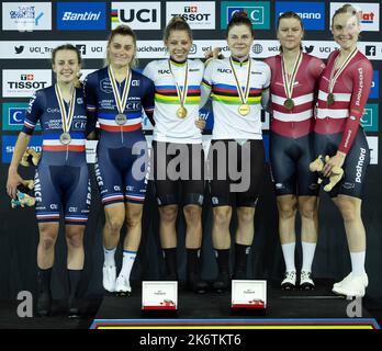 French pair Clara Copponi and Valentine Fortin, Belgian pair Shari Bossuyt and Lotte Kopecky and Danish pair Amalie Dideriksen and Julie Leth celebrate on the podium of the women's Madison race on day four of the UCI Track World Championships, at the Saint-Quentin-en-Yvelines velodrome in Montigny-le-Bretonneux, France, Saturday 15 October 2022. The World Championships take place from 12 to 16 October 2022. BELGA PHOTO BENOIT DOPPAGNE Credit: Belga News Agency/Alamy Live News Stock Photo