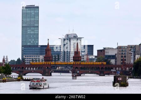 Spree with Oberbaum Bridge and Treptowers high-rise, Berlin, Germany Stock Photo