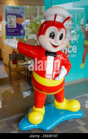 2022-09-29 Manila Philippines, Statue of the Jollibee Mascot Statue outside a Jollibee Resturant at the Mall of Asia in Manila Philippines Stock Photo