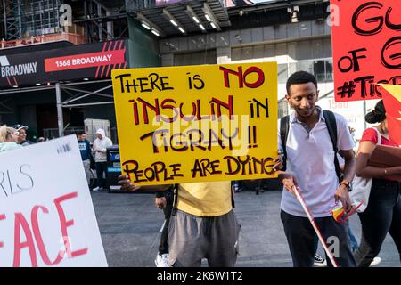 New York, USA. 15th Oct, 2022. Activists staged rally against Ethiopia war in Tigray on Times Square in New York on October 15, 2022. (Photo by Lev Radin/Sipa USA) Credit: Sipa USA/Alamy Live News Stock Photo