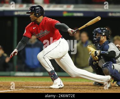 Cleveland Guardians' Oscar Gonzalez hits a single during the third inning  of a baseball game against the Miami Marlins, Sunday, April 23, 2023, in  Cleveland. (AP Photo/Nick Cammett Stock Photo - Alamy