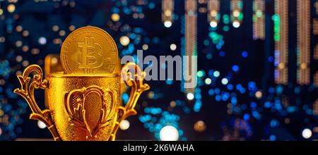 Bitcoins - the new modern currency for bitcoin payments ,  Golden Bitcoin Cryptocurrency on computer circuit board. Stock Photo