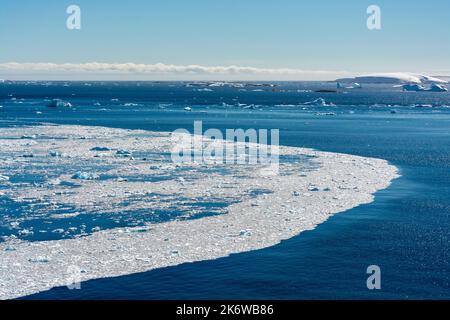 brash ice floating on waters of northern approach to lemaire channel ...