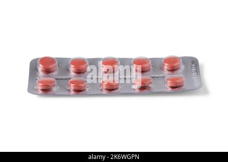 Red pills in blister pack isolated on white background Stock Photo