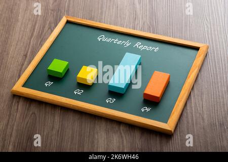 Bar graph on blackboard. Company stock finance performance and fundamental. Stock Photo