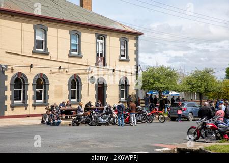 Orange motorcycle club members meet in Millthorpe historic village ,regional New South Wales,Australia Stock Photo