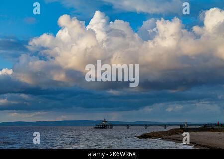 Clevedon Pier with Cumulonimbus clouds overhead Stock Photo