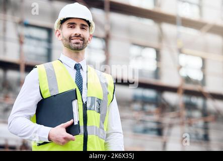 Ive got to make sure safety measures are in place. a mature male architect working at a building site. Stock Photo