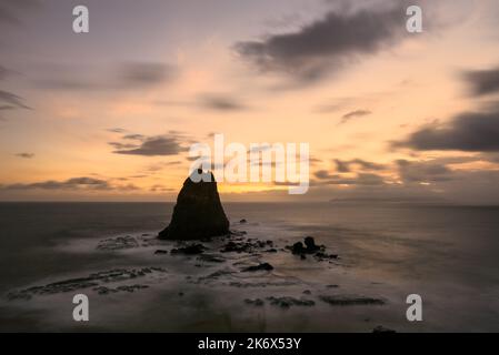 Sunset at Tanjung Papuma in Jember, East Java, Indonesia Stock Photo