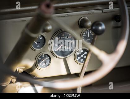 WW2 old US jeep speed dial dashboard in restored world war two military American 4x4 Stock Photo