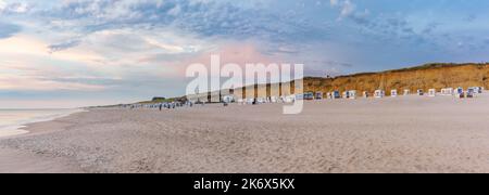 Sunset and beach chairs - Kampen Beach on the island Sylt Stock Photo