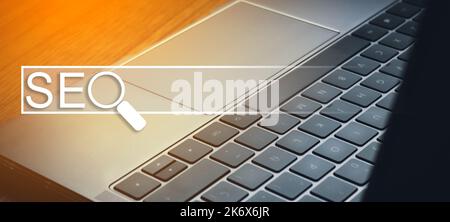 Banner photo of laptop with VR concept of SEO. Search Engine Optimization concept. Ranking traffic on website. Digital marketing business technology. Stock Photo
