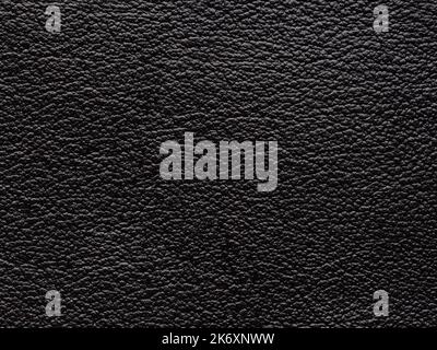 Textured surface of black leather product. Black artificial leather with waves and folds on PVC base. Can use as wallpaper or backdrop luxury event Stock Photo