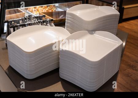 Close-up view of the food tray and tongs in the bakery shop. Stock Photo