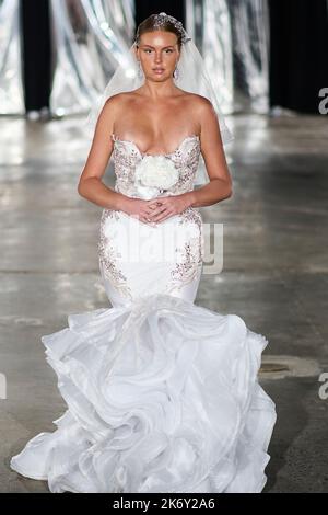 A model walks for designer 'Bodied by Jojo' at New York Fashion Week The Society at the Hall of Mirrors. Regal Bridal Gown. Stock Photo