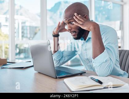 Could this day get any worse. a young businessman looking stressed at work. Stock Photo