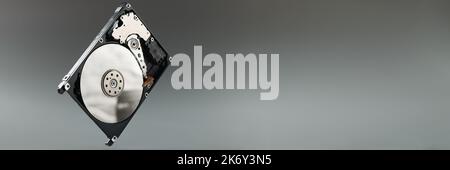 New hard drive pc a gray background, close-up Stock Photo
