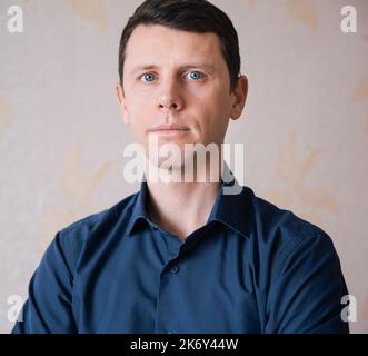 Handsome business man in blue shirt. Stock Photo