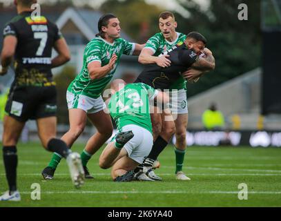 Leeds, UK. 16th Oct, 2022. *** Liam Byrne Frankie Halton and George King of Ireland stop a Jamaica attack during the Rugby League World Cup 2022 match between Jamaica RL and Ireland RL at Headingley Stadium, Leeds, UK on 16 October 2022. Photo by Simon Hall. Editorial use only, license required for commercial use. No use in betting, games or a single club/league/player publications. Credit: UK Sports Pics Ltd/Alamy Live News Stock Photo