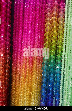 background of necklaces made with beads for sale in the costume jewelry store Stock Photo