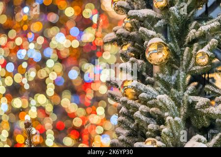 Traditional Christmas ball on a fir tree branch close-up Stock Photo
