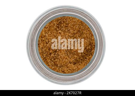 High angle photo of bowl of brown sugar on isolated white background Stock Photo