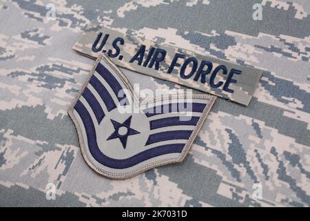 August 31, 2020. US AIR FORCE branch tape and Staff Sergeant rank patch on digital tiger-stripe pattern Airman Battle Uniform (ABU) Stock Photo