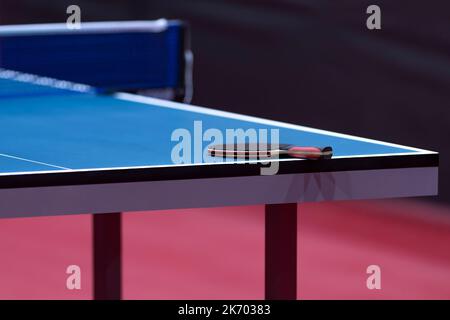 Professional blue table tennis table and racket. Horizontal sport theme poster, greeting cards, headers, website and app Stock Photo