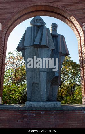 Marx and Engels statues in Memento Park an open-air museum dedicated to monumental statues  from Hungary's Communist period, Budapest, Hungary, Stock Photo