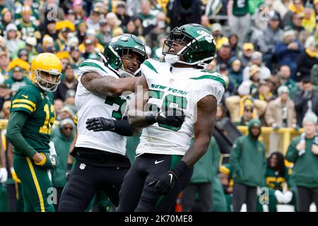 New York Jets linebacker Quincy Williams (56) reacts after a defensive play  against the New England Patriots during the fourth quarter of an NFL  football game, Sunday, Sept. 24, 2023, in East