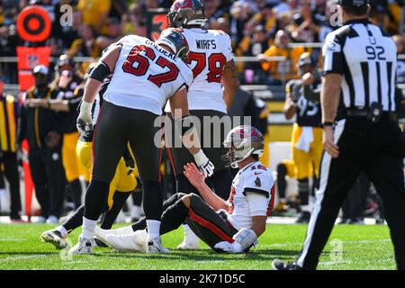 Tampa Bay Buccaneers guard Luke Goedeke (67) prepares to make a block  during the second half of an NFL football game against the Minnesota  Vikings, Sunday, Sept. 10, 2023, in Minneapolis. (AP