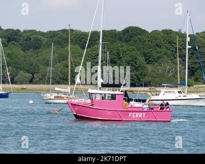 Pink painted Hamble Warsash Ferry Emily on the Hamble River, Southampton, Hampshire, UK Stock Photo