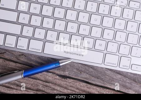Ransomware word on keyboard - Business Concept Stock Photo