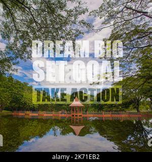 Motivational quotes "dream big set goal take action" on nature background Stock Photo