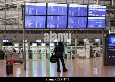 Hamburg, Germany. 16th Oct, 2022. Flight cancellations are announced on display boards at Hamburg Airport. The Vereinigung Cockpit (pilots' union) has called on Eurowinds pilots to walk off the job from 00:00 on Monday, (Oct. 17) to Wednesday (Oct. 19) inclusive. The industrial action has begun as planned, said a spokesman for the Vereinigung Cockpit (VC) pilots' union. No further offer had been submitted. Credit: Bodo Marks/Bodo Marks/dpa/Alamy Live News Stock Photo